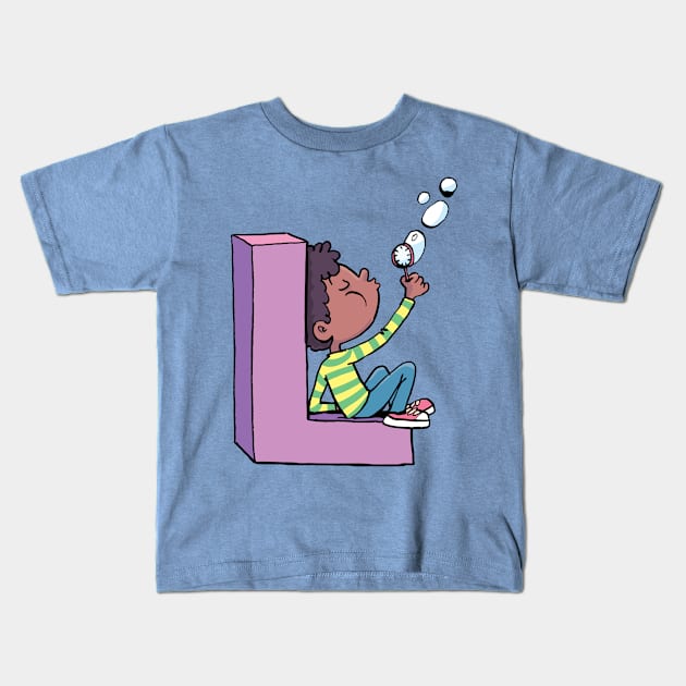 boy blows soap bubbles while sitting on the letter L Kids T-Shirt by duxpavlic